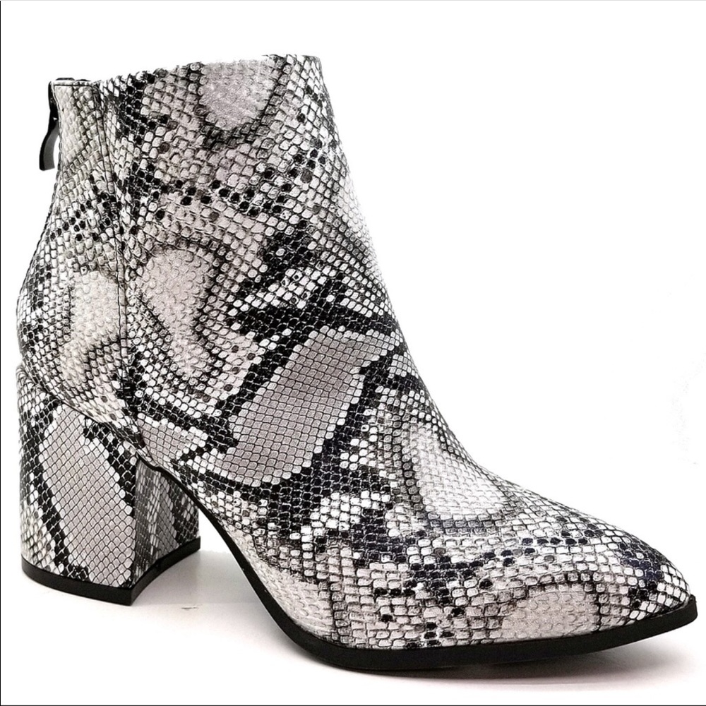 Black and white python print block heel booties.